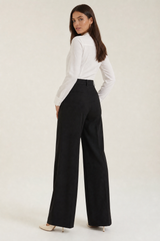 Mia Black high-rise wide-leg trousers rear three-quarter