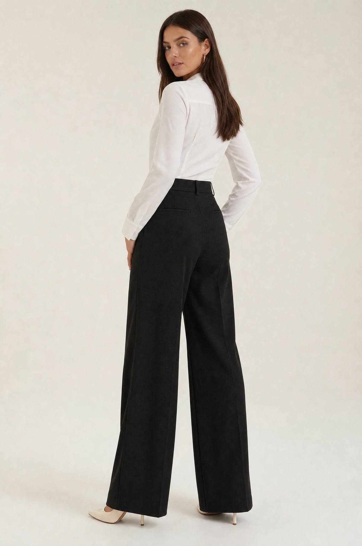 Mia Black high-rise wide-leg trousers rear three-quarter