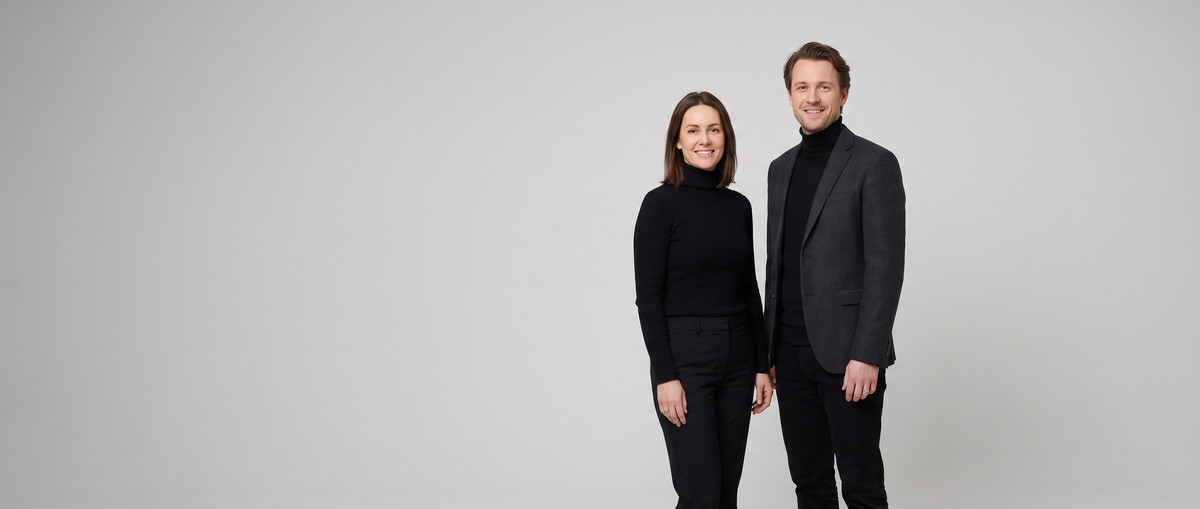 Woman and man in black essentials